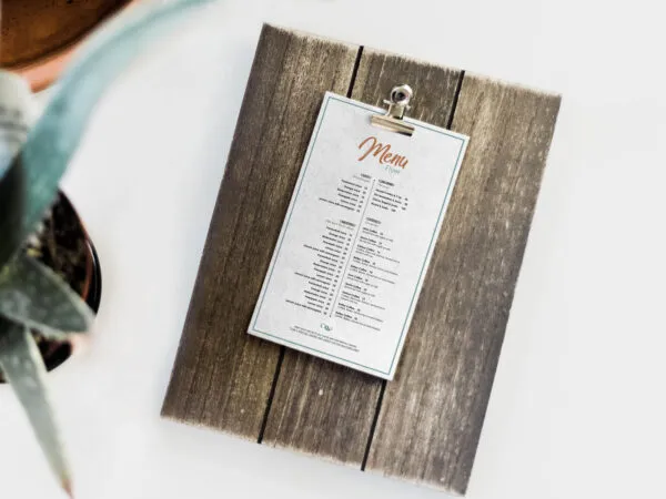 Mockup Showing a Restaurant Menu Card on a Wooden Board 1