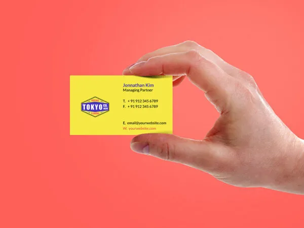 Mockup featuring a Hand Holding a Business Card 1