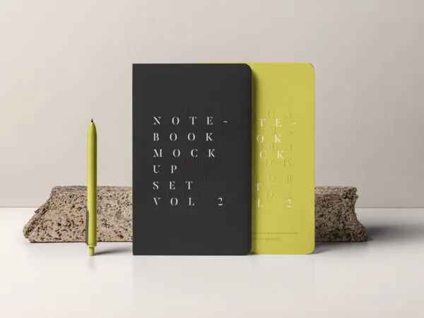 Mockup of 2 Standing Notebooks with Stone and Pen 1