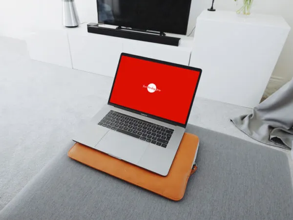 Mockup of MacBook Pro in Living Room with a Wide 34 Angle View 1