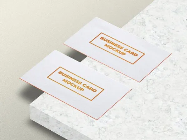 Mockup of Two Business Cards Laid in Perspective 1