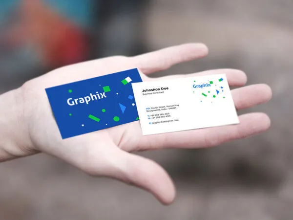 Mockup of Two Business Cards in Hand 1