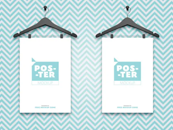 Mockup of Two Posters Hanging From Hangers on the Wall 1