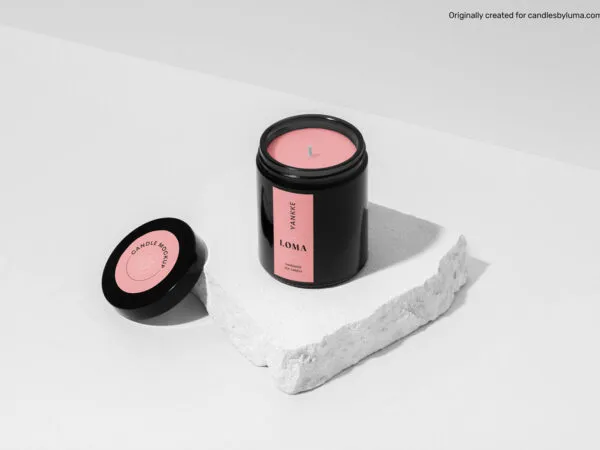 Mockup of a Candle Placed on a Piece of Stone 1