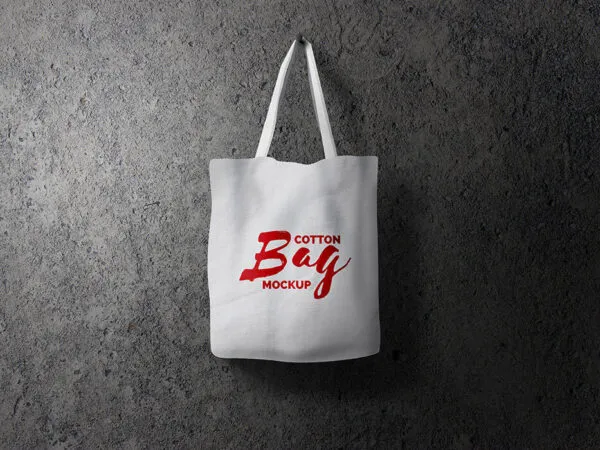 Mockup of a Cotton Bag Hung on a Nail 1