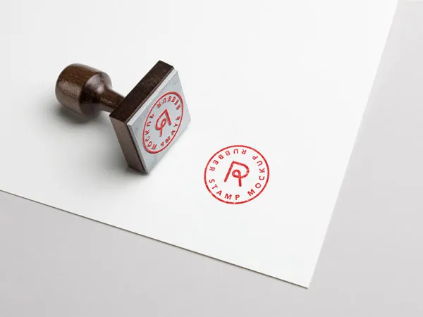 Mockup of a Diagonal Rubber Stamp on a Sheet of Paper 1