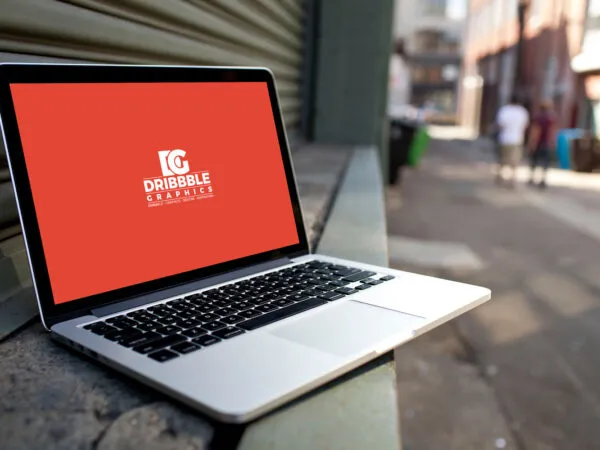 Mockup of a Perspective View Laptop in Street 1