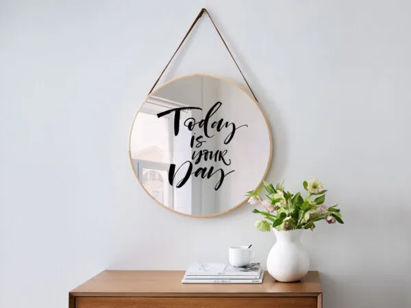 Mockup of a Round Mirror Hanging on the Wall 1