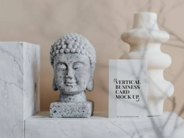 Mockup of a Vertical Business Card in Front View Featuring a Buddha Bust 1