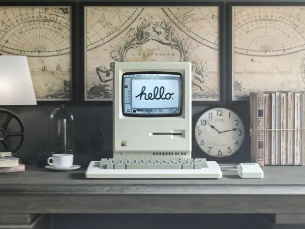Mockup of a Vintage 1984 Apple Macintosh on a Desk 1