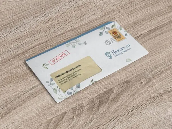 Mockup of a Windowed Envelope Lying on a Wooden Surface 1