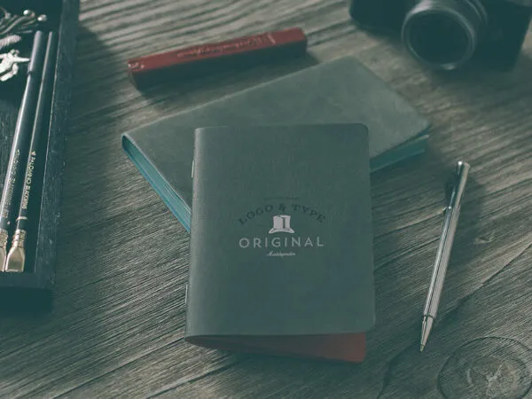 Mockups Showcasing Four Various Scene of Notebook 1