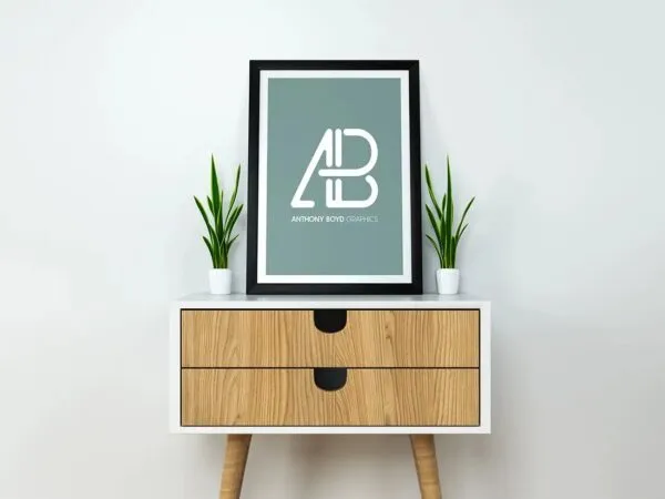 Modern Vertical Poster on a Desk Mockup 1