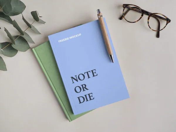 Notebook Mockup Featuring Pen and Glasses 1