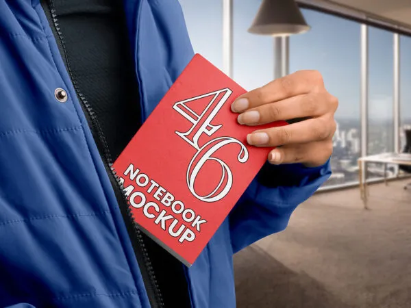 Notebook in Hand Mockup 1