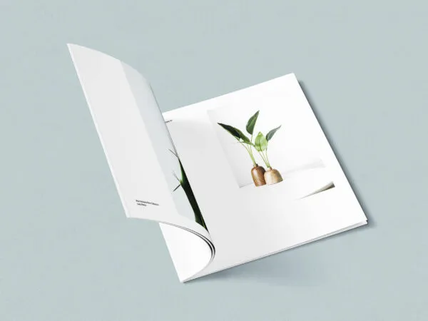 Opened Magazine with Squared Pages Mockup 1