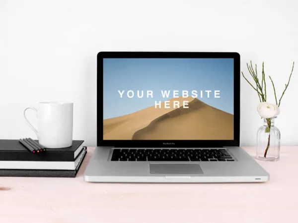 Organized MacBook Pro on a Desk Mockup 1
