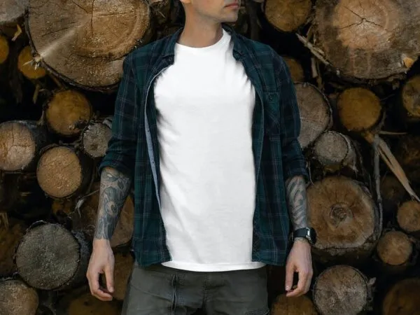 Outdoor Tattooed Model Wearing Shirt Over T Shirt Mockup 1