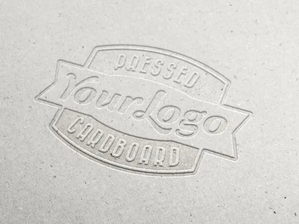 Overhead View of Logo on Cardboard with Letter Pressed Effect Mockup 1