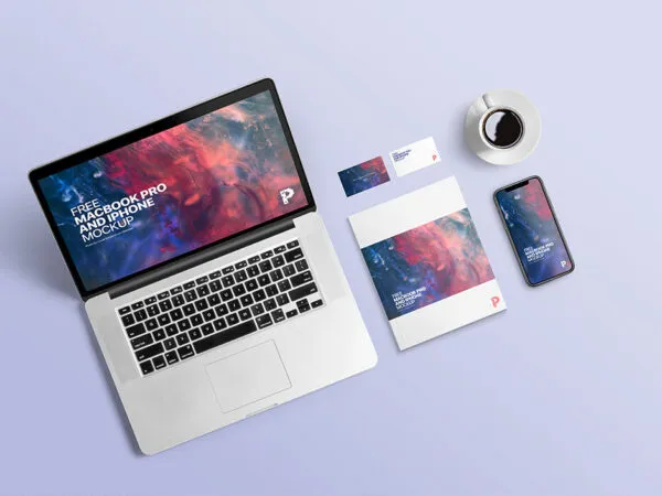 Overhead View of MacBook Pro iPhone Business Cards and Magazine Mockup 1