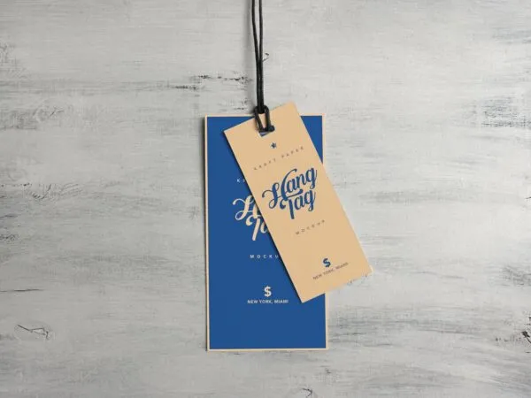 Overhead View of Two Cloth Tags on Wooden Surface Mockup 1