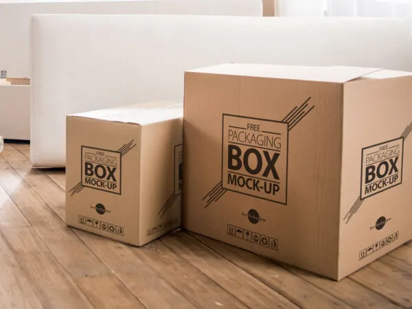 Packaging Boxes on Wooden Floor With Internal Design Mockup 1