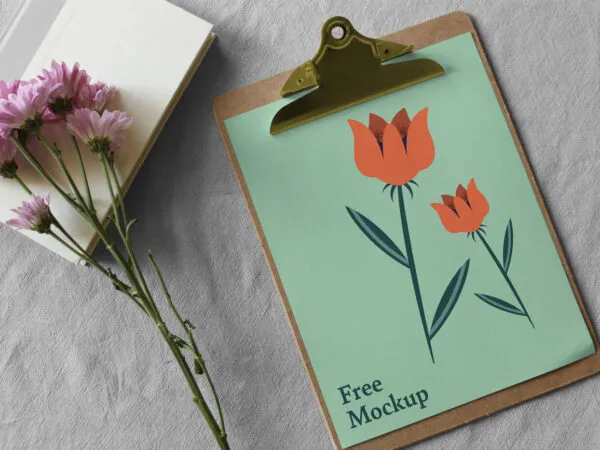 Paper Clipboard Mockup Along With Flowers 1