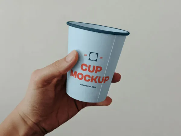 Paper Coffee Cup in Hand Mockup 1
