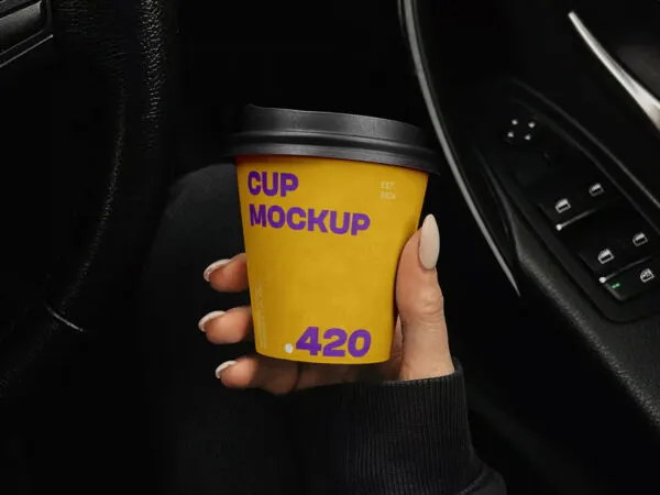Paper Coffee Cup in the Car Mockup 1