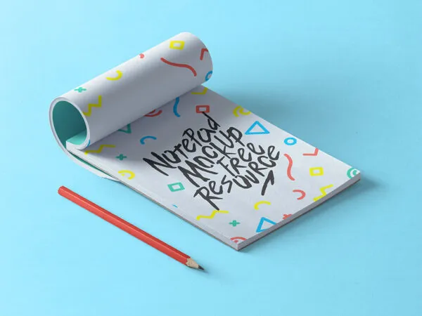 Partly Rolled Notepad Mockup with a Pen 1