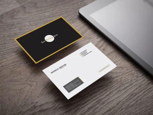 Perspective View Mockup Featuring Two Business Cards on Wooden Table 1