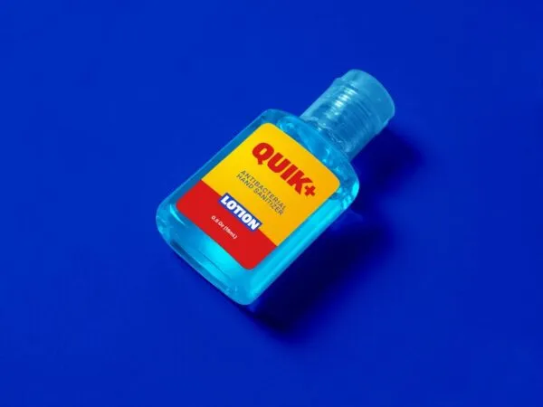Perspective View Small Hand Sanitizer Bottle on Floor Mockup 1