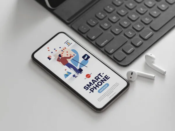 Perspective View Smartphone Mockup with Ear Pods and Keyboard 1