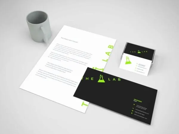 Perspective View of Branding Stationery Mockup Next to a Mug 1