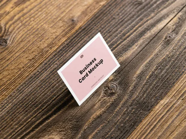 Perspective View of Business Card Mockup in Wood Background 1