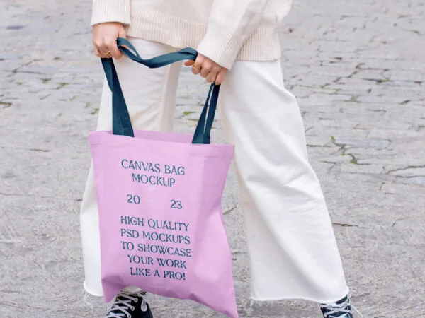 Perspective View of Fashion Canvas Bag Mockup in Hands 1
