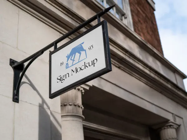 Perspective View of Hanging Sign Mockup in Outdoor Wall 1