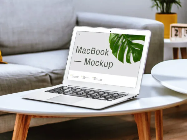 Perspective View of MacBook Mockup on Table 1