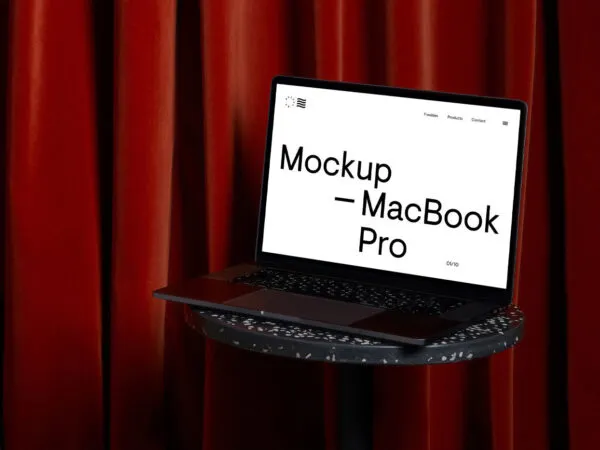 Perspective View of MacBook Pro Mockup on Coffee Table 1