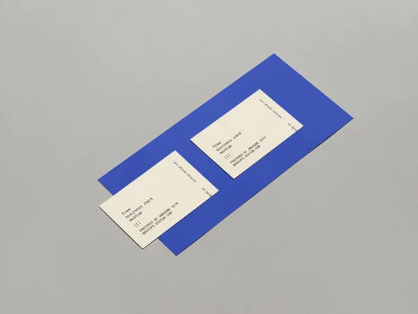 Perspective View of Two Business Cards on Paper Mockup 1