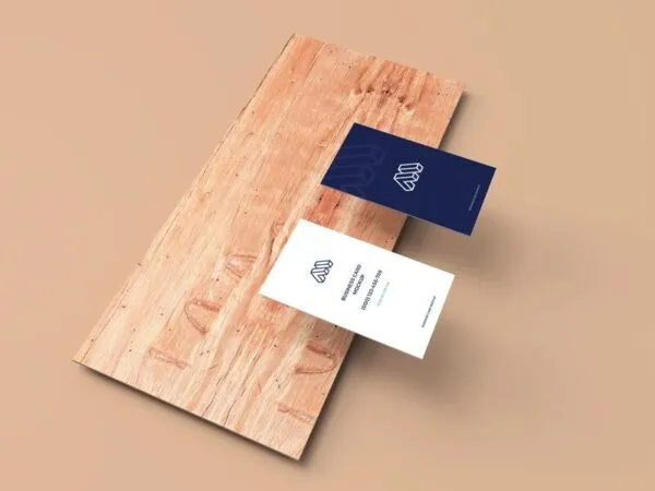 Perspective View of Two Business Cards on Plank Mockup 1