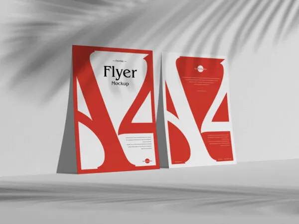 Perspective View of Two Flyers Against Wall with Overlaid Shadow Mockup 1