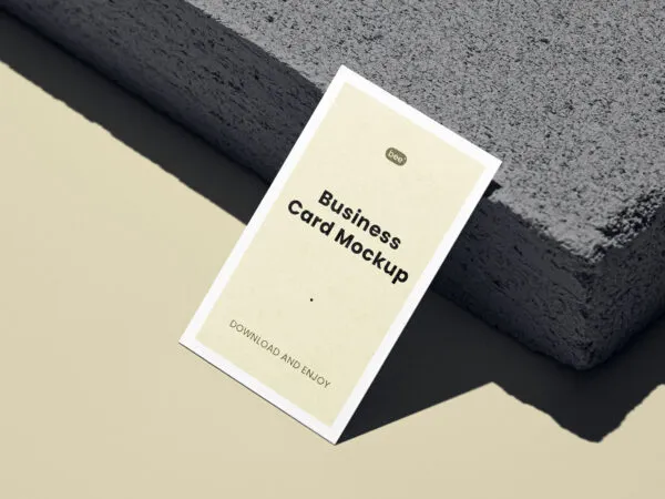 Perspective View of Vertical Business Card Mockup against Brick 1