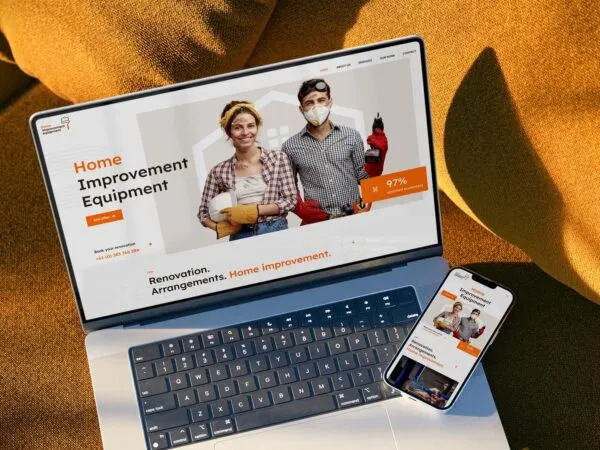 Perspective View of a MacBook Pro and an iPhone 13 Mockup 1