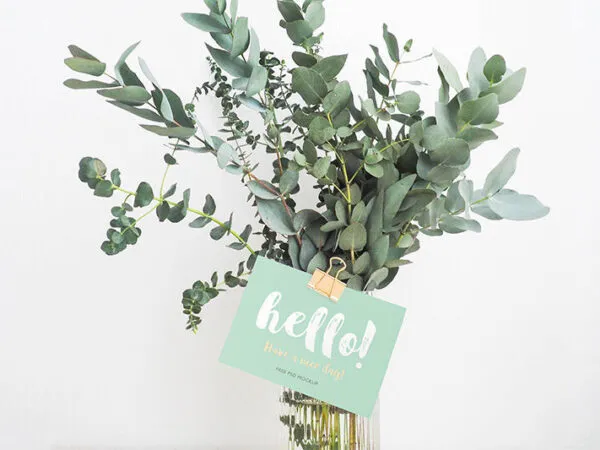 Plain and Realistic Gift Card Mockup Stick to a Flower 1
