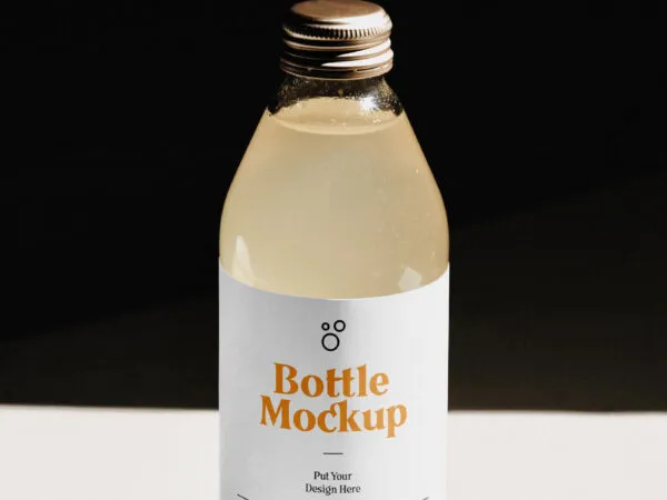 Realistic Glass Bottle Mockup with a Dark Background 1