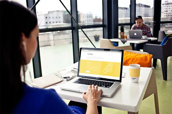 Realistic MacBook Pro Photo Indoor Mockup 1