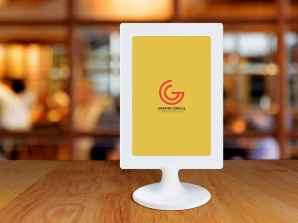 Restaurant Framed Stand Up Menu on a Wooden Table Mockup 1