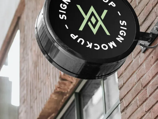 Rounded Sign Mockup on Brick Building Wall 1