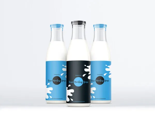 Set of Three Glass Milk Bottles Mockup 1